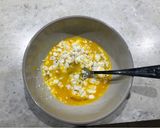 A picture of step 2 of Quick asparagus, bacon & feta scramble.