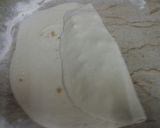 A picture of step 9 of Salsa chicken cheese bread.