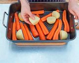 A picture of step 4 of Roast Chicken with Potatoes & Carrots.