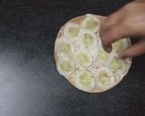 A picture of step 2 of Sandwich pizza from leftover Roti.