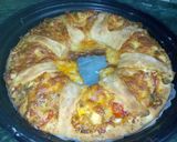 A picture of step 10 of Double trouble 5 cheese's pizza.