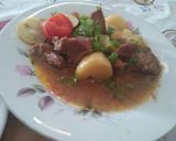 A picture of step 4 of Alloo gosht.