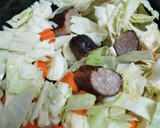 A picture of step 3 of Slow Cooker Bratwurst and Cabbage.