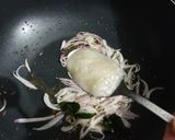 A picture of step 2 of Baingan and Aloo fry.