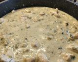 A picture of step 4 of Chicken Enchiladas (white sauce).