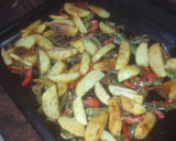 Foto del paso 4 de la receta: Muslitos de pollo glaseados con papas panaderas