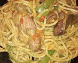 A picture of step 4 of Spaghetti jollof with grilled gizzard.