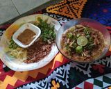 A picture of step 7 of Beef haleem with boil rice.