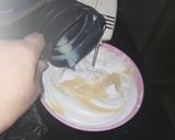 A picture of step 2 of Oreo vanilla ice cream with caramel sauce.