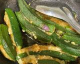 A picture of step 4 of Paneer Aloo stuffed bhindi with achari masala.