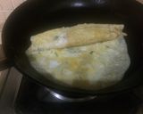 A picture of step 2 of Egg cheese roll.