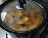 A picture of step 4 of Instant chicken Tikka Pizza in frying pan.