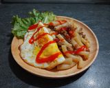 Hình bước làm 5 của món Nui xào bò bằm & trứng ốp la