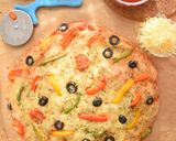A picture of step 13 of Heart shaped Veg pizza.