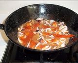 Foto del paso 6 de la receta Fideos finos con judías blancas, calamares y almejas