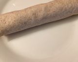 A picture of step 4 of Peanut Butter Banana Roll Up.