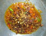 A picture of step 6 of Spicy daal karela.