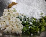A picture of step 1 of Spring onion & cauliflower fritters.