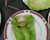A picture of step 10 of Nutty lemony cabbage roll in green sauce.