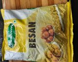 A picture of step 1 of Besan onion tomato chilla.