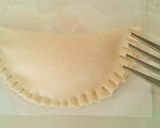 Foto del paso 4 de la receta: Empanadillas de Bonito al horno