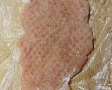 Medvehagymás fűszeres, sajtos vajjal töltött rántott karaj recept fázis 1 fotója