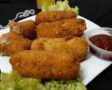 A picture of step 11 of Chicken,Aalu, cheez,roll.
