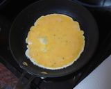 Foto del paso 2 de la receta: Bocadillo de lomo con tortilla francesa, tomate asado y alioli