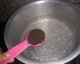 A picture of step 1 of Karak chai.