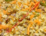 A picture of step 4 of Poha Upma with carrot.