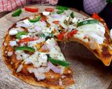 A picture of step 8 of Pizza Paratha or Desi Pizza, without oven.