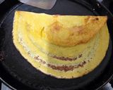 A picture of step 3 of Besan rava paper dosa.