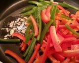 A picture of step 4 of Stir fry Peppers with Marinated Chicken Slices.