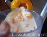 A picture of step 7 of Orange kulfi (made with fresh juice).
