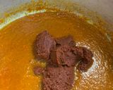 A picture of step 6 of Ghanaian fish stew.
