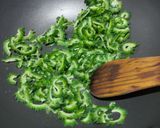 A picture of step 2 of Kaju Karela.