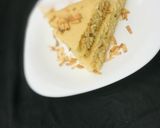 A picture of step 3 of Basbausa (semolina cake).