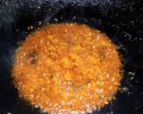A picture of step 14 of Khatay aloo.