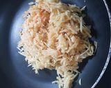 A picture of step 3 of Apple Cake twisted garnishing with milkmaid and honey.