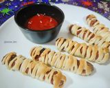 Foto del paso 5 de la receta: Salchichas momia para Halloween