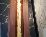 A picture of step 5 of Grand Marnier Bûche de Noël with Mandarin Insert.
