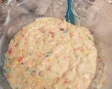 A picture of step 5 of Fruity Pebbles Muffins.