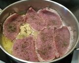 A picture of step 2 of Pork Chops, Broccolli, Rice, and Mushroom Gravy.