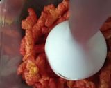 A picture of step 2 of Cheetos Flamin Hot Fried Chicken.