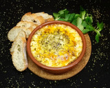 Foto del paso 4 de la receta: Queso Provolone con salsa de tomate, al horno