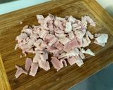 Une image de l'étape 7 de Riz gratiné aux deux fromages, courgette, persil et jambon.