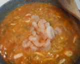 Foto del paso 4 de la receta: Arroz con chipirones y gambas
