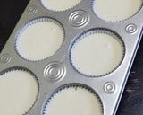 A picture of step 5 of Mini Cheesecake with Blueberry Sauce.