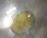 A picture of step 3 of Green Garlic And Fresh Haldi Instant Pickle.