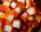 Foto del paso 2 de la receta: Tronquitos de surimi al ajillo en airfryer